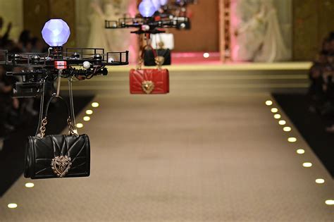 Drones model purses at Dolce & Gabbana fashion show 